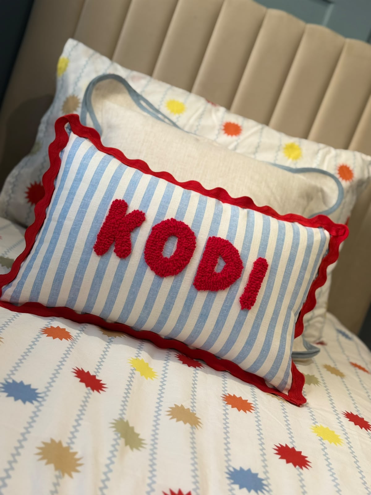 Wavy Cushion- Blue Stripes With Red Trim